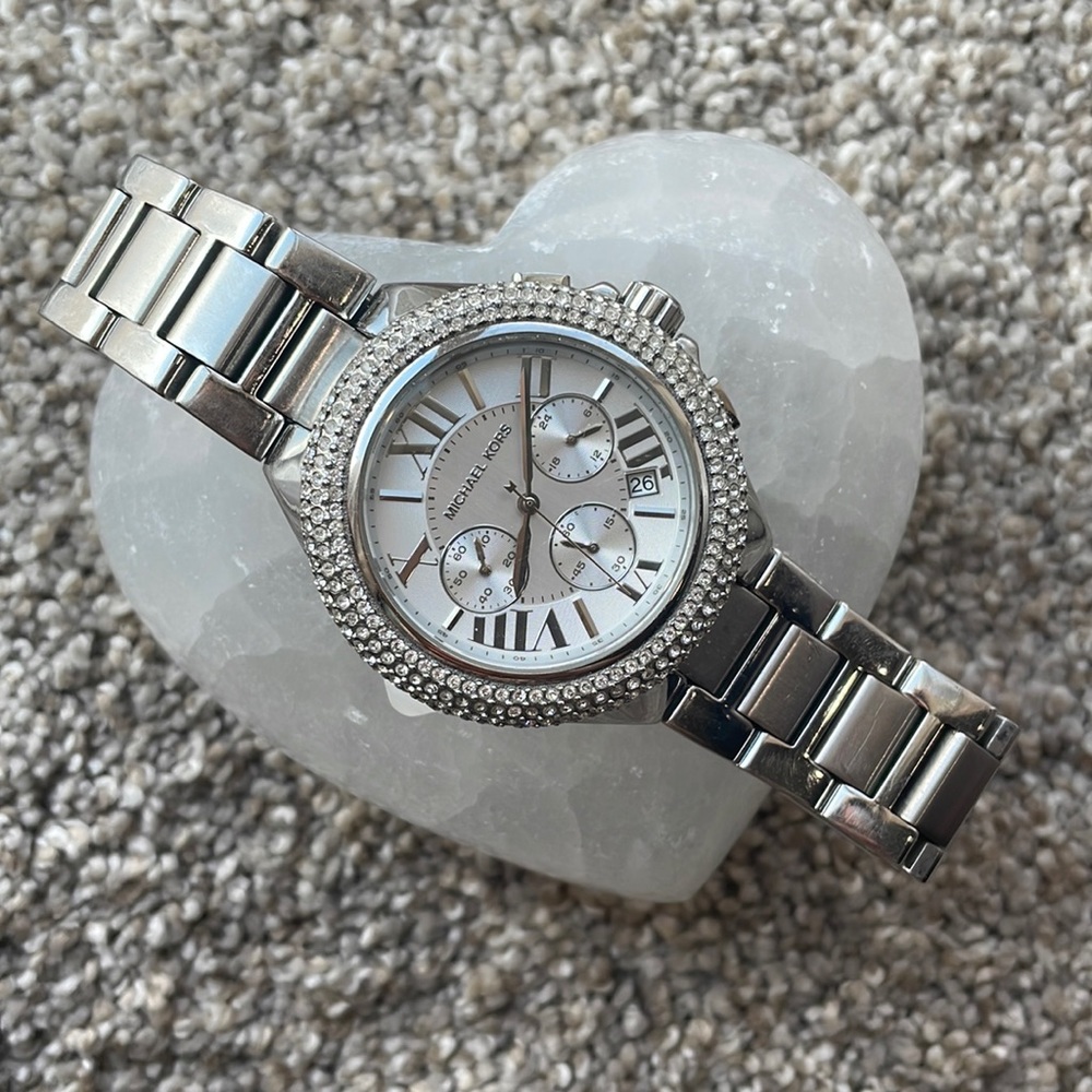 Michael Kors watch. Good condition, no missing diamonds.